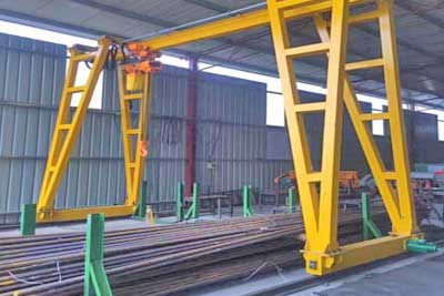 Truss leg portable rail gantry crane for steel handling 