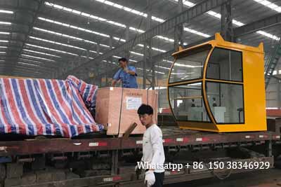 Parts and driver's cabin loaded into truck for delivery 