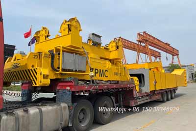 Parts and container spreader loaded into truck for delivery Uzbekistan