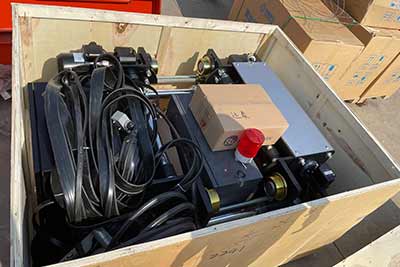 Parts and driver's cabin loaded into truck for delivery 