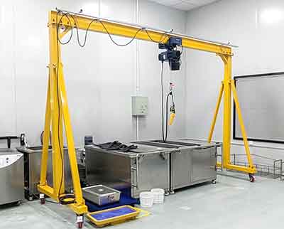 Fixed height gantry crane for smal workshop or warehouse material handling 