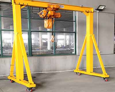 Roller travelling shop gantry crane, easy relocation from working site to site. 