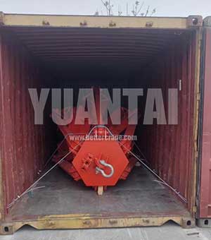 Double rope orange peel grab loading into container