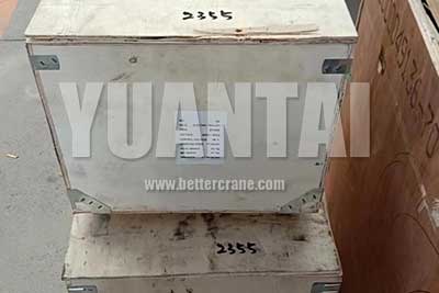 2 ton portable gantry cranes, electric hoists, and parts packed for delivery