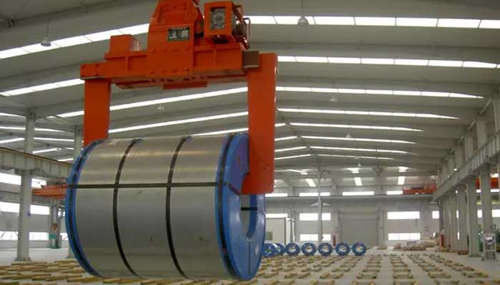 Electric overhead crane with clamp for steel coil handling 