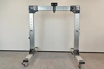 Adjustable gantry crane with telescoping height and span 