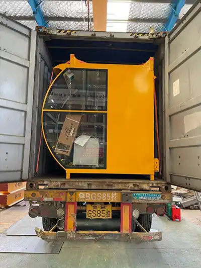 Main components of 50 ton overhead bridge crane loaded into container, the crane cabin at sight.