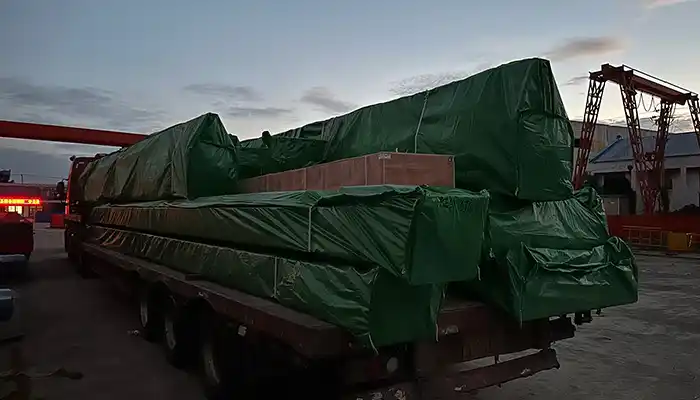 Main parts and components of 10 ton single girder overhead crane loaded into trucks for delivery 