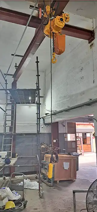 Electric chain hoist installed on the monorail crane girder