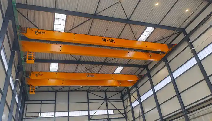 double girder double hoist overhead crane with 10 ton + 10 ton capacity for sale Poland 