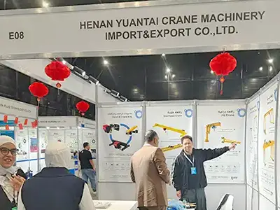Yuantai Cranes booth attracting international buyers interested in European-style hoists, RTG cranes, and overhead crane technology.