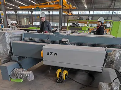 European style low headroom hoist showcased during Spanish customer factory visit