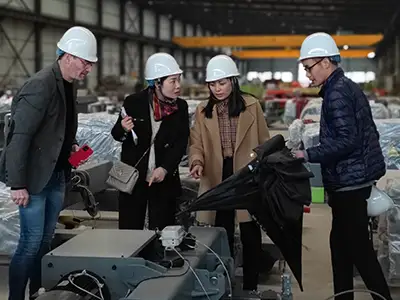 Spanish clients visiting Yuantai Crane factory in China for European style hoist solutions