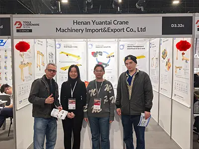 Yuantai Cranes booth at Poland exhibition displaying European standard overhead cranes from 1 ton to 320 ton