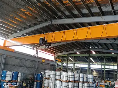 10T HD Overhead Crane with European Hoist for Steel Coil Handling This Papua New Guinea project includes a 10 ton HD single girder overhead crane designed for steel coil lifting and workshop material transfer. The crane is equipped with a European style electric hoist, 20.9 m span, 5.045 m lifting height, and 415V 50Hz 3 Phase power supply.