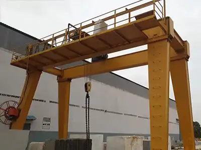35 Ton Gantry Crane and 10 Ton Overhead Crane Project in Angola Yuantai Cranes supplied a complete lifting solution for an industrial project in Angola, including a 35 ton MGO gantry crane and a 10 ton HD overhead crane with European style hoist. The cranes are designed for heavy material handling and factory production operations.