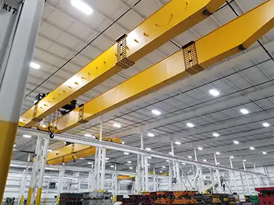 40 Ton Double Girder Overhead Crane Project in the USA Yuantai Cranes supplied two 40 ton QDX double girder overhead cranes for a US industrial project. The cranes feature a 22 m span range and 10.688 m lifting height, supporting heavy-duty material handling operations.