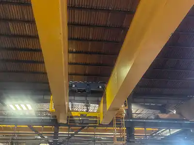 Customized 15 Ton Double Girder Crane Design for Pakistan Customer Based on the workshop layout and lifting requirements, Yuantai Cranes designed a QDX double girder overhead crane with a 35 m span. The solution provides reliable operation for wide-area industrial material handling.